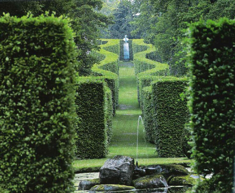 Figures in a landscape sculpture in the British garden (From our